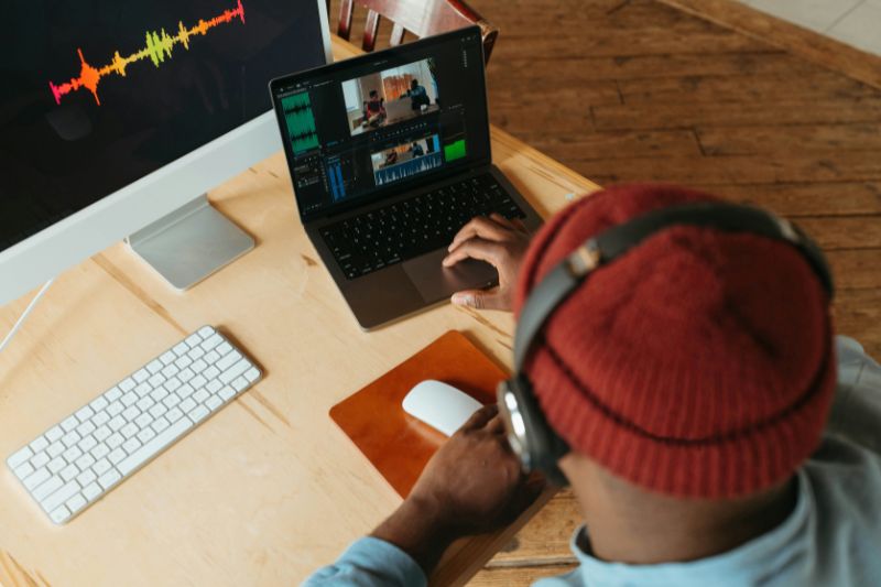 A man editing a podcast