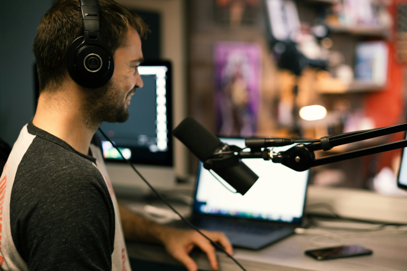 man recording a podcast