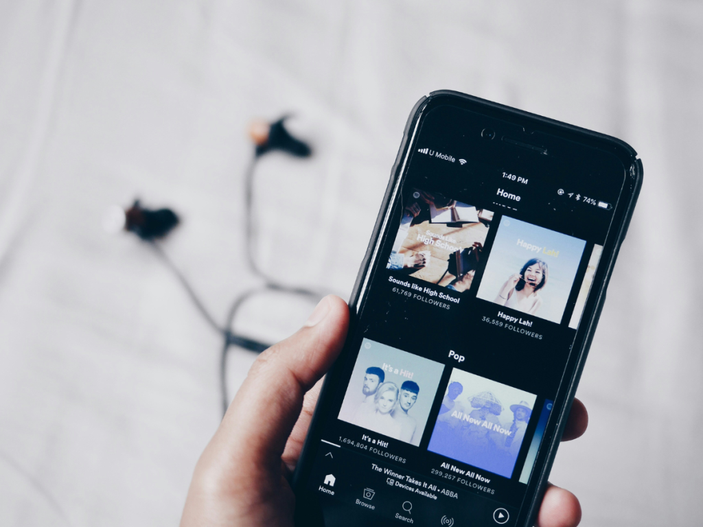 Person listening to podcasts on phone